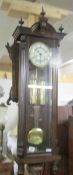 A Victorian Vienna double weight wall clock.