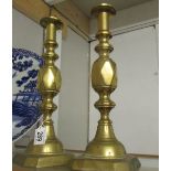 A pair of Victorian 'Age of Diamonds' brass candlesticks.