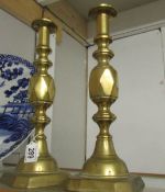 A pair of Victorian 'Age of Diamonds' brass candlesticks.