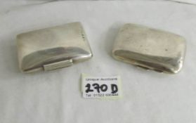 A ladies silver purse and a ladies silver cigarette case.