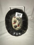 An unusual antique toy in a terrapin shell style frame (frame A/F)