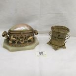 A Palais Royal gilt money box and a mother of pearl and gilt ring box.