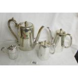 A coffee pot and a small pot both marked SS Flora and 2 other pots.