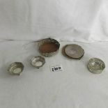 A silver powder compact and 4 other silver items.