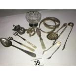 A mixed lot of silver items including 2 bangles, 2 sugar nips, 2 pickle forks, a spoon,