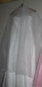An Amanda Wyatt white wedding gown, size 12.