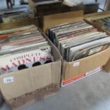 2 boxes of assorted LP records.