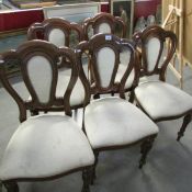 A set of 10 chairs comprising 2 carvers and 8 diners.