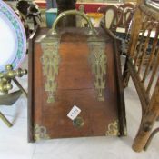 A Victorian oak coal box (missing liner).