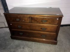 A 2 over 3 mahogany chest of drawers