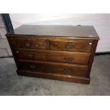 A 2 over 3 mahogany chest of drawers