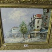 An oil on board Parisian scene signed Burnett.