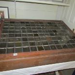 A magic lantern slide display cabinet and 6 boxes of magic lantern slides.