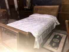 A wooden bedstead (mattress not included)