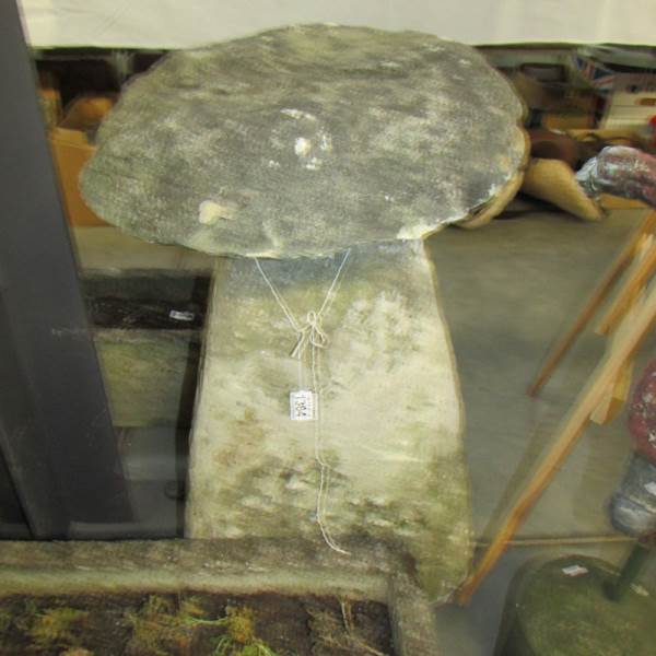 A large granite staddle stone.