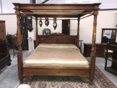 A 6ft wide four poster bed (mattress not included)