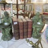 A pair of monk figures as bookends.