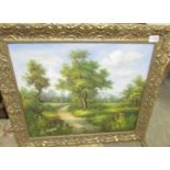 An original gilt framed oil on canvas rural scene.
