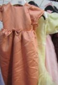 4 various flower girl dresses, pink, yellow and 2 peach, ages 2 - 3 years.