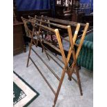 An unusual antique scissor clothes rail