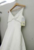 An ivory wedding gown, size 10.