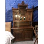 A fabulous Edwardian mahogany buffet with Art Nouveau style doors and leaded glass panels