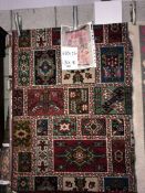 A large patterned rug size 4'4" x 3'0"