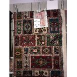 A large patterned rug size 4'4" x 3'0"