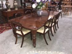 A fine Victorian dining table and a set of 8 Victorian balloon back chairs