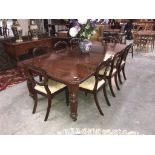 A fine Victorian dining table and a set of 8 Victorian balloon back chairs