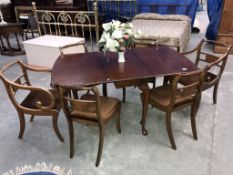 A dining table and 6 chairs