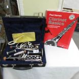 A Blessing clarinet in case with 2 tutor guides.