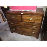 A 2 over 2 mahogany chest of drawers