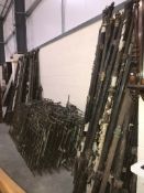 A large quantity of brass and iron bed posts and rails