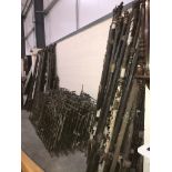 A large quantity of brass and iron bed posts and rails
