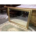 A gilt framed mirror