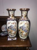 A pair of large oriental vases