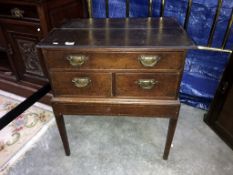 A chest of drawers on legs
