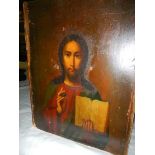 A very early 'Icon' depicting Jesus on wood, 17.5 x 22 cm.
