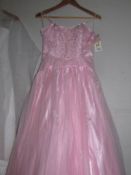 A blush pink bridesmaid's dress, size 10.