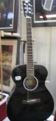 A good Tanglewood acoustic guitar, Model TLFBK.