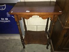 A 2 tier mahogany side table.