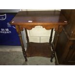 A 2 tier mahogany side table.