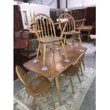 6 Ercol chairs and an Ercol style table