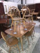 6 Ercol chairs and an Ercol style table