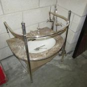 A good quality marble effect wash basin complete with stand and fittings.