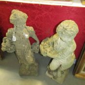 2 garden statues, both carrying baskets, approximately 72 cm tall.