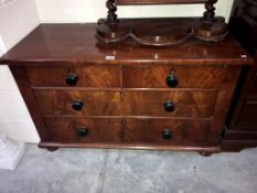 A 2 over 2 mahogany chest of drawers