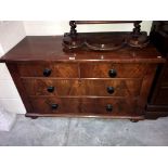 A 2 over 2 mahogany chest of drawers