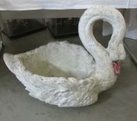 A large swan planter.